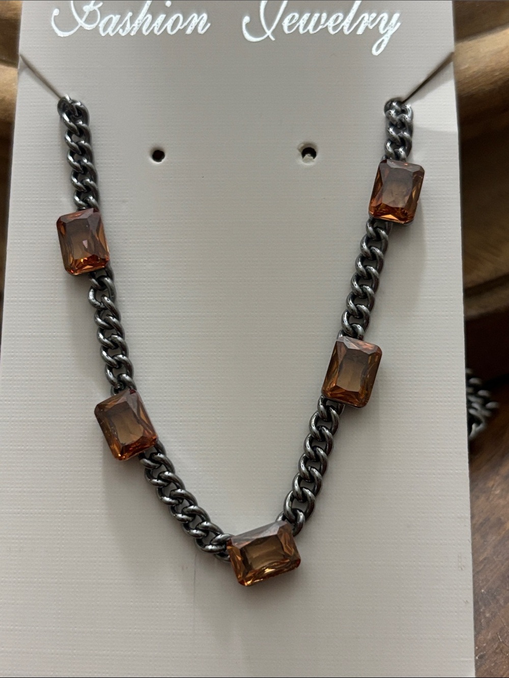 BP necklace 18-20.5”. Dark topaz on hematite chain.